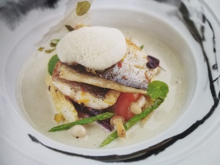 Baked Asian Sea Bass coconut curry& pineapple salsa and pina colada foam