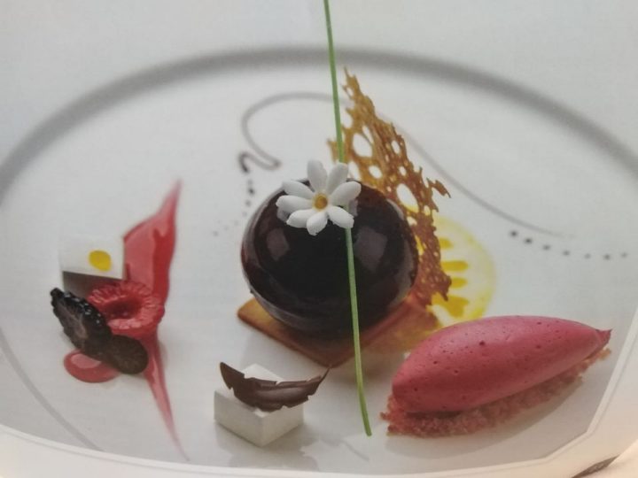 chocolate orange mouse in mango cream brulee and raspberry crumble